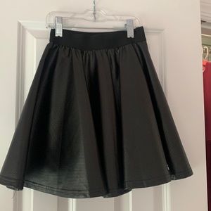 Black faux leather pull on skirt